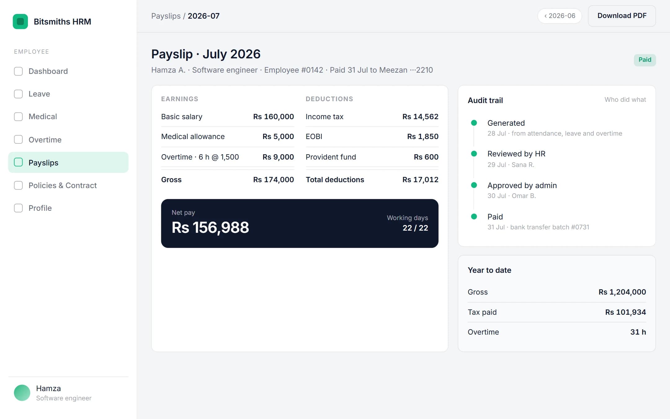 Bitsmiths HRM: Payslip on a laptop